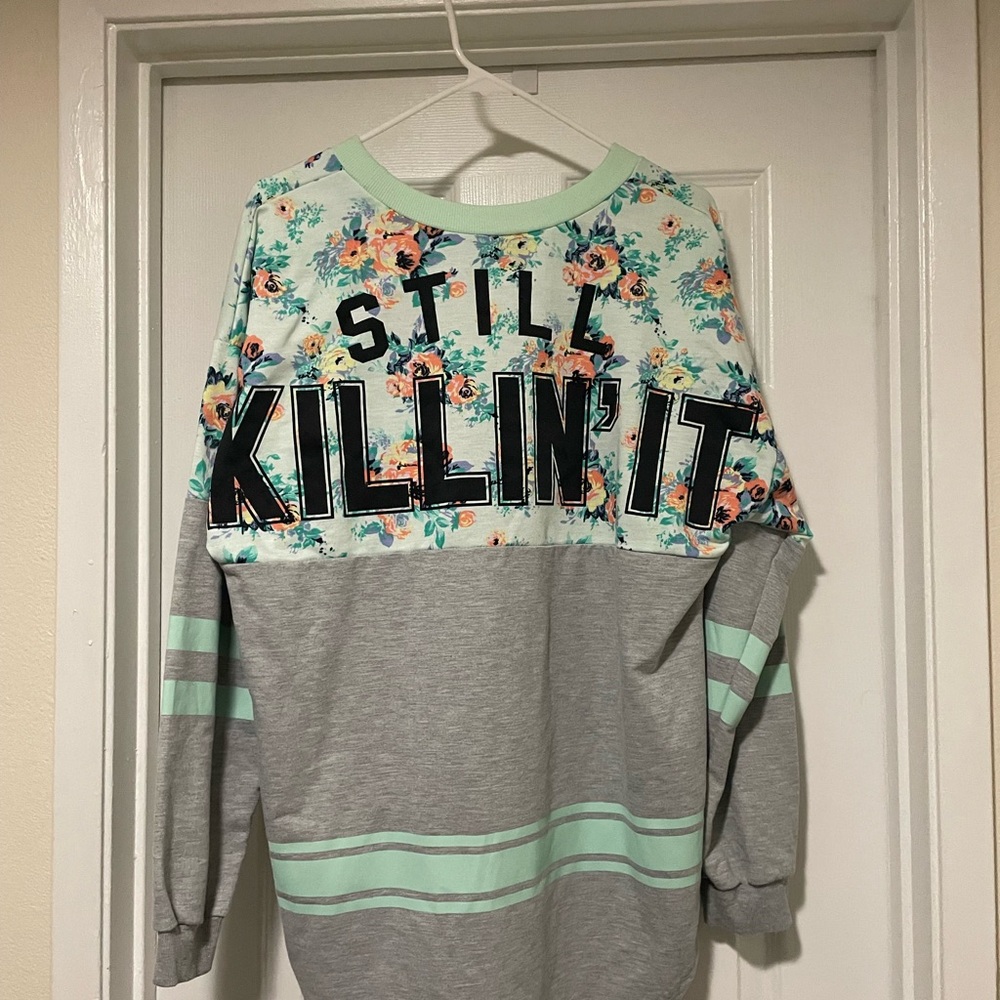 Woman’s ‘Killin it’ sweater